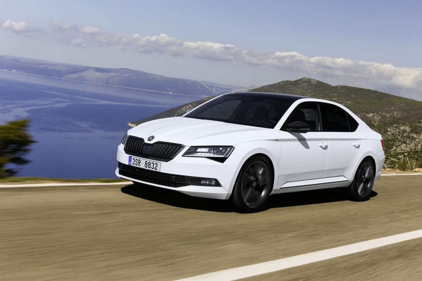 Škoda Superb 2016 white – front view on Dalmatian coast